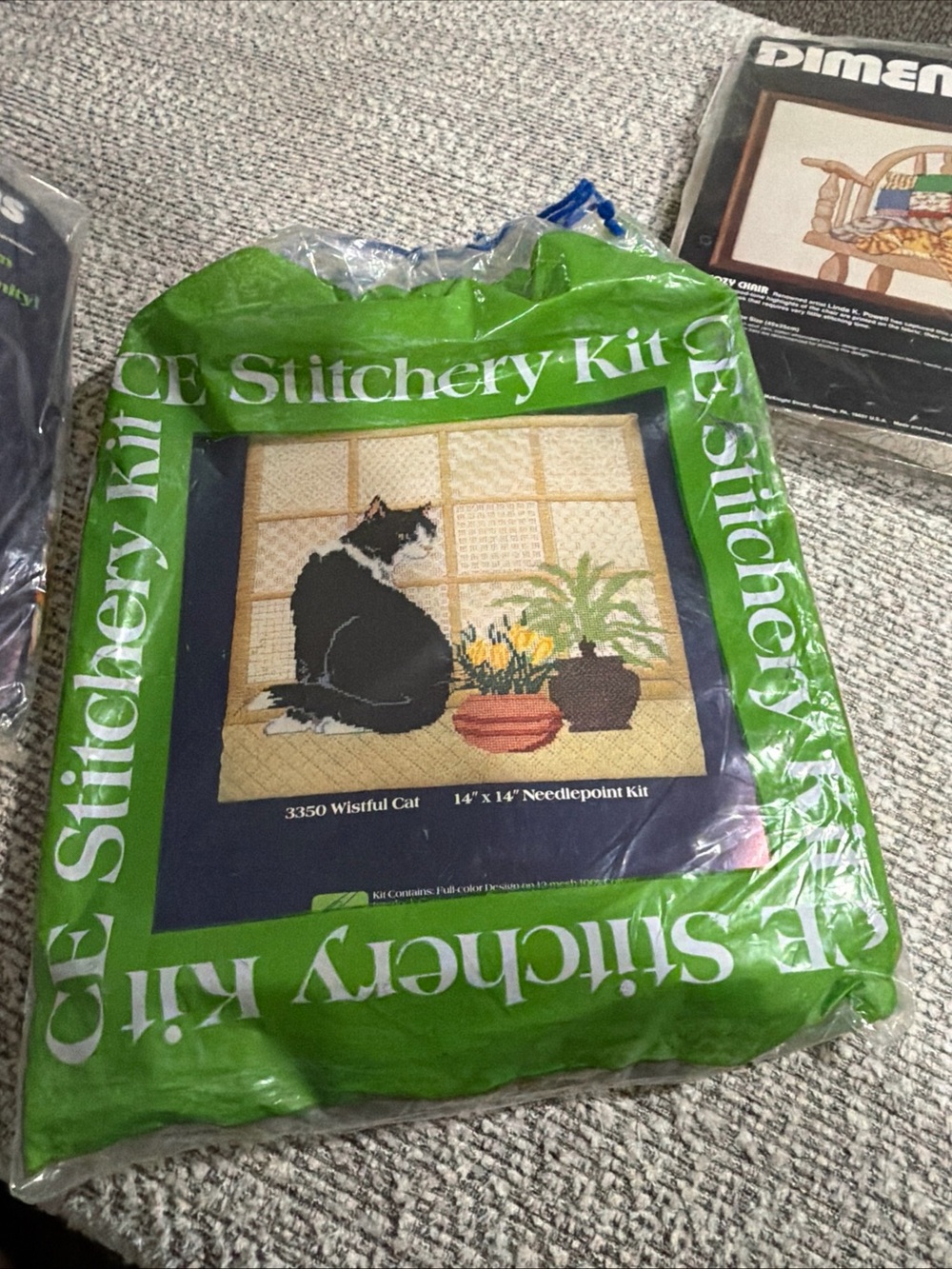 - Green "Wistful Cat" Needlepoint Kit